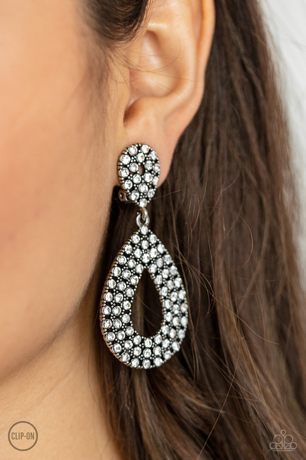 Paparazzi - Pack In The Pizzazz - White Clip-On Earrings