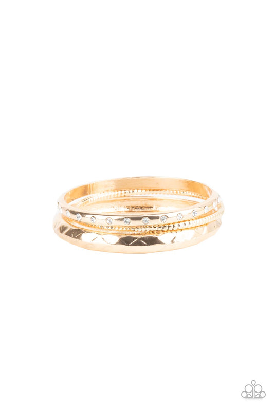 Paparazzi - Confidently Curvaceous - Gold Bracelet